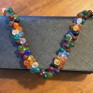 Like-new vintage Renaud Pellegrino straw clutch with multicolor glass bead strap